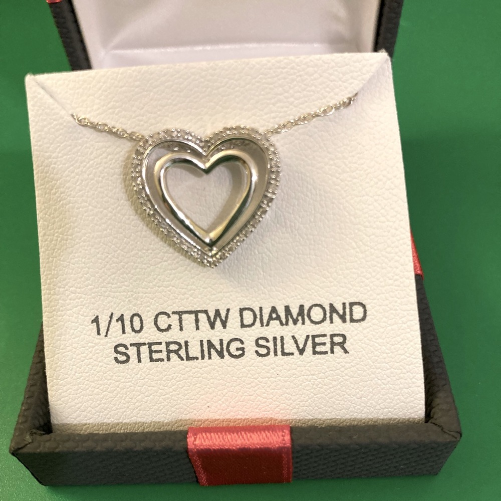 NWT Sterling silver 1/10 CTTW diamond heart necklace. 18” chain.
